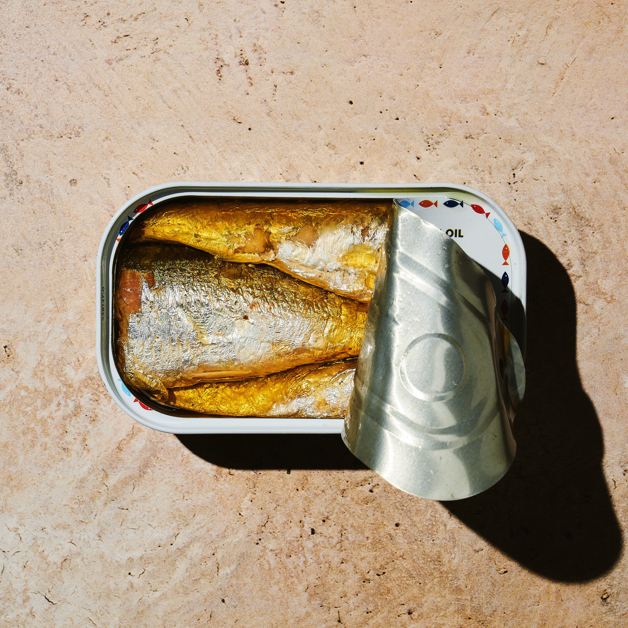 Open tin of BELA product