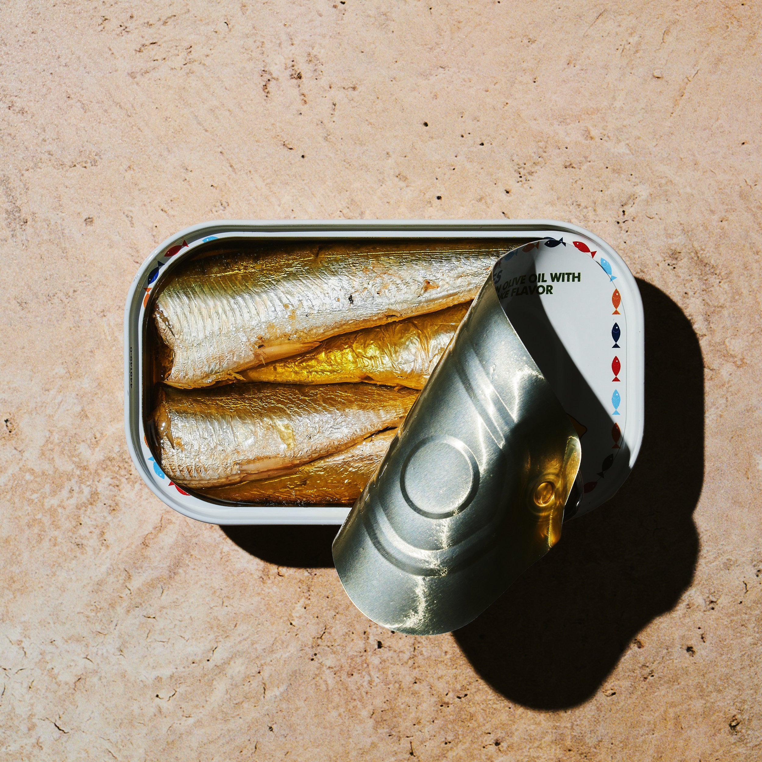 Open tin of BELA product