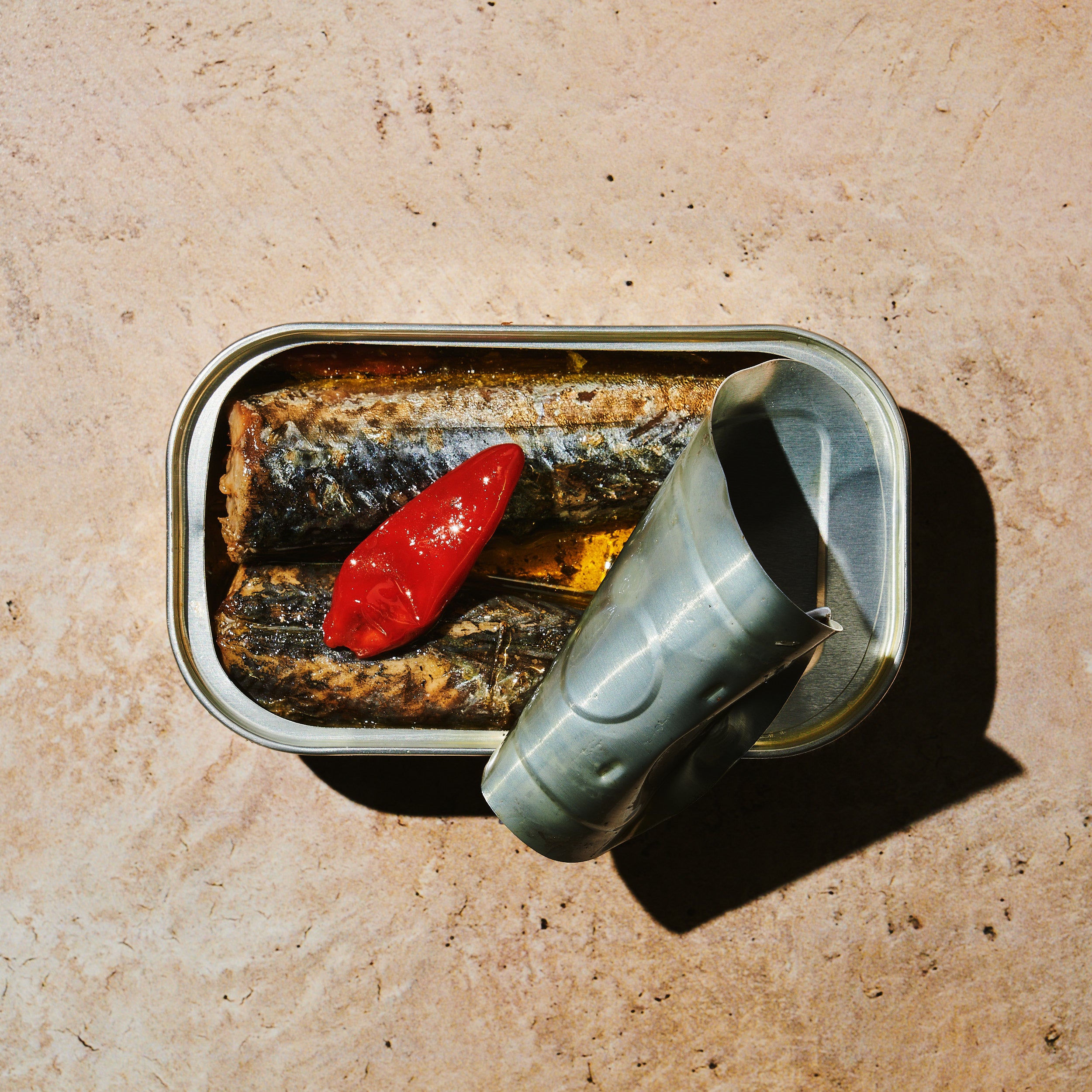 Open tin of BELA product