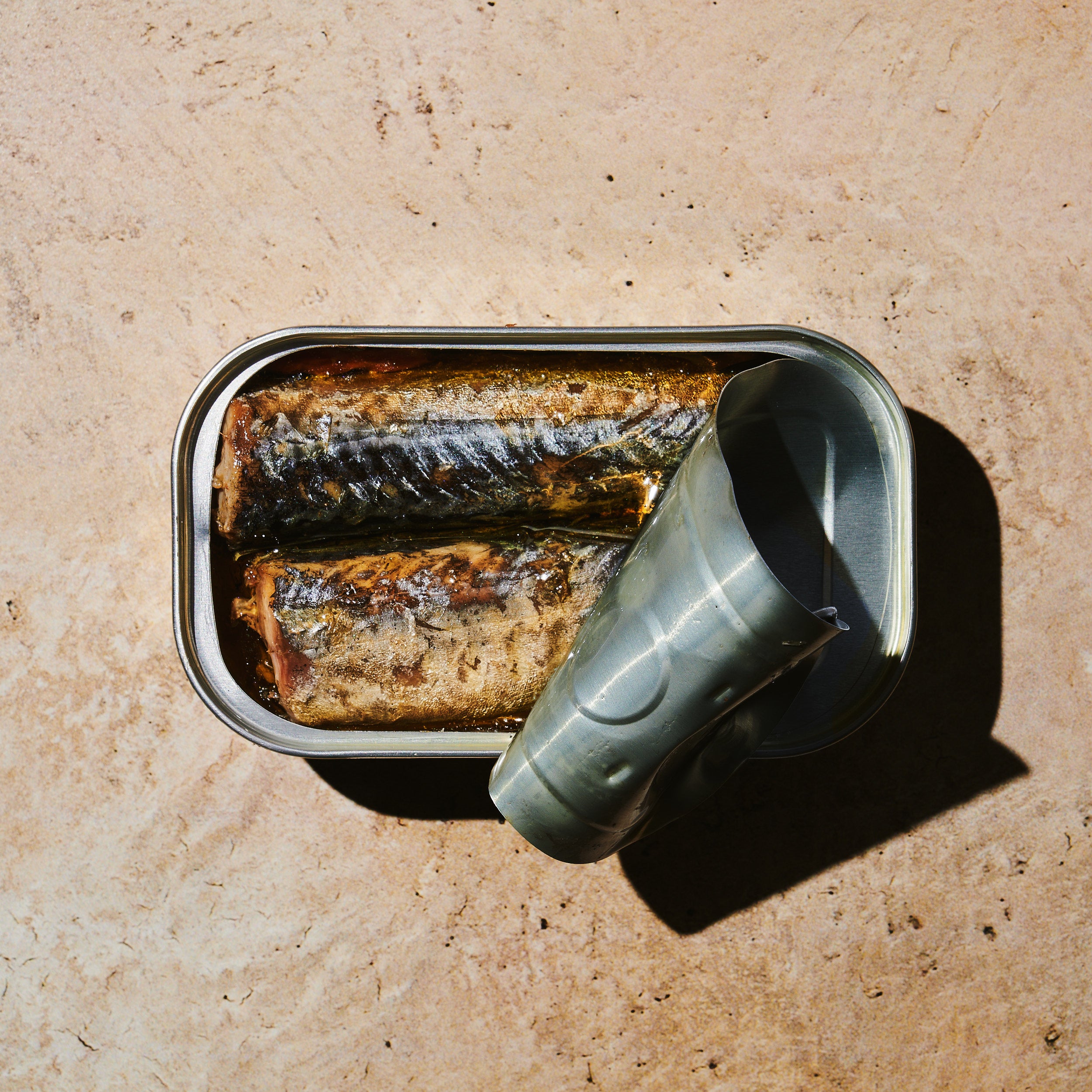 Open tin of BELA product