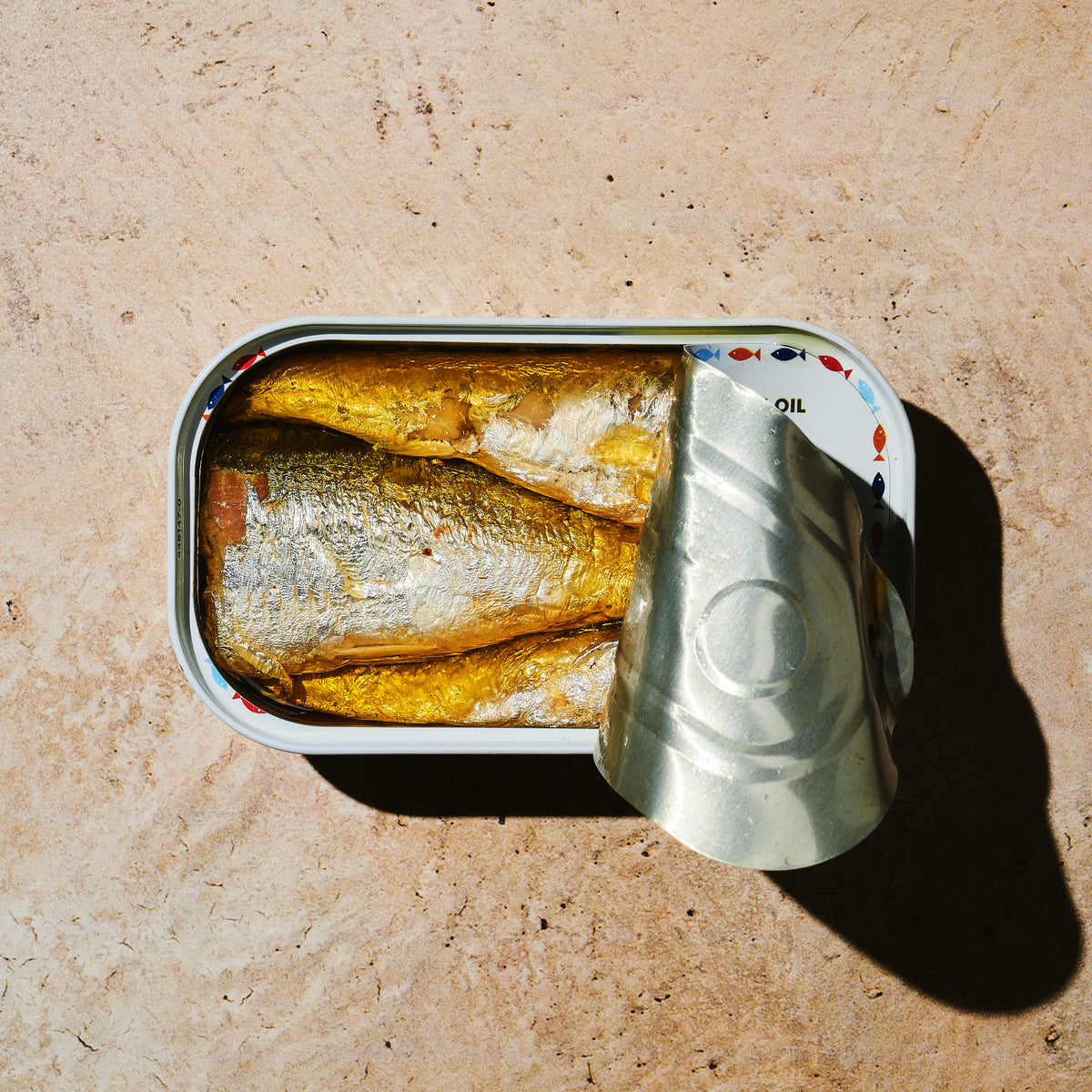 Open tin of BELA product