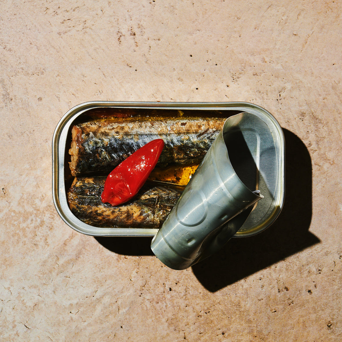 Open tin of BELA product