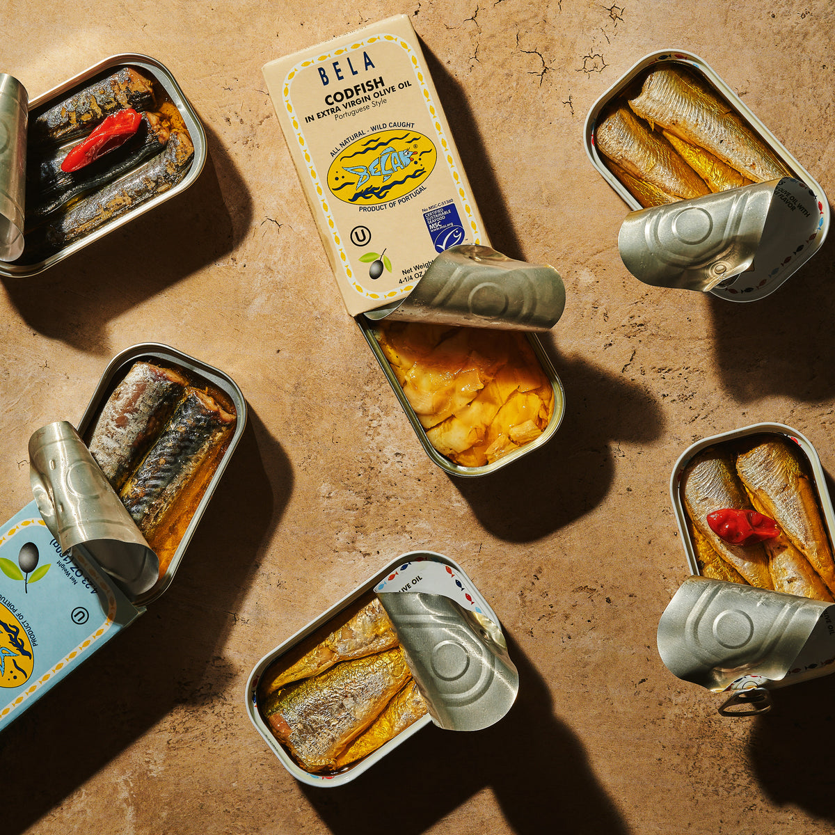 Various tins of BELA products